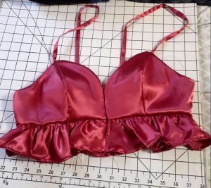 Apricot top made of red satin fabric